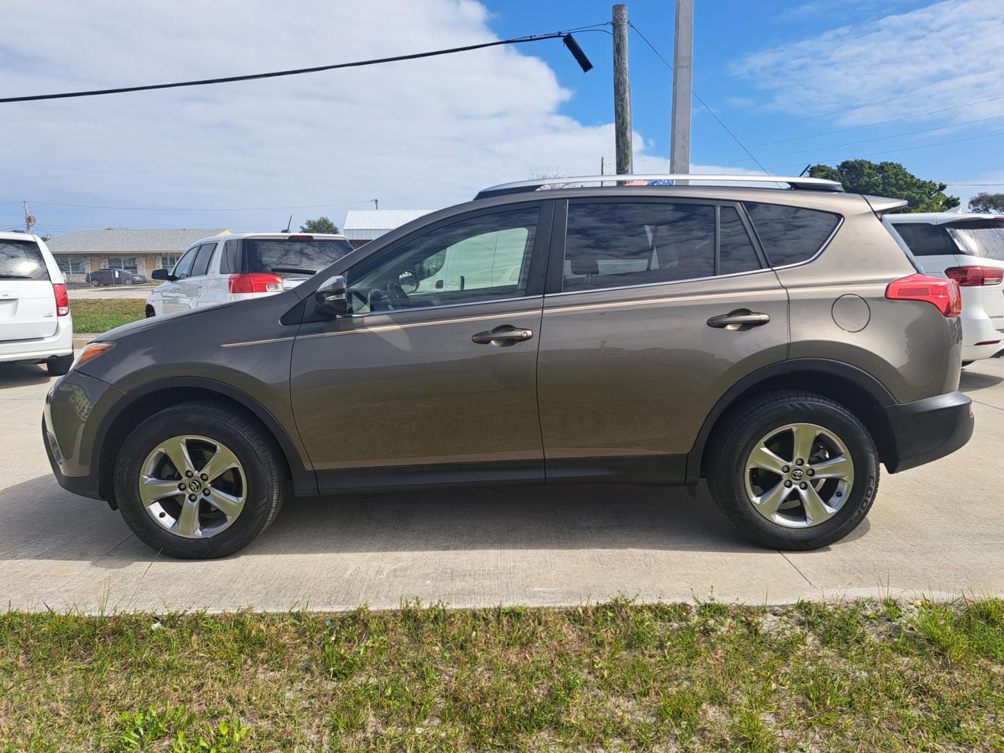 2015 BROWN Toyota RAV4 (JTMWFREV8FD) , AUTOMATIC transmission, located at 1181 Aurora Rd, Melbourne, FL, 32935, (321) 241-1100, 28.132914, -80.639175 - Photo#0